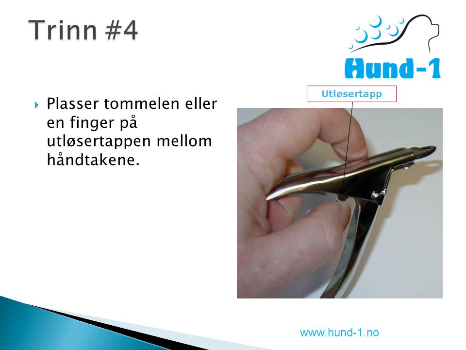 Plasser tommelen eller en finger på utløsertappen mellom håndtakene. Utløsertapp